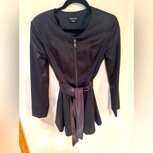 Shiny trench with removable faux fur shoulder piece.